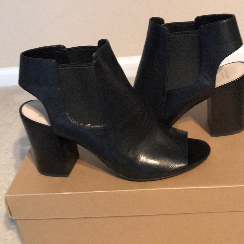 Coach black leather shoes.